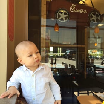 Chick-fil-A - My nephew tired from playing in the playground. Very clean - Fast Food Near Me - Newport, Kentucky