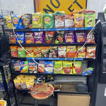 Mike's Drive Thru & Beverage - a vending machine and a display of chips - Beverage Store Near Me - Akron, Ohio Mike's Drive Thru & Beverage - a vending machine and a display of chips - Beverage Store Near Me - Akron, Ohio