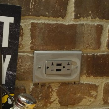 Buffalo Wild Wings - Wall outlets for phone charging convenience at the booths along the wall. - Sports Bars Near Me - Greenfield, Indiana