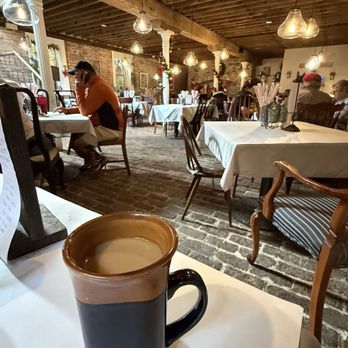 Debi's Restaurant - Coffee while waiting for breakfast and admiring these original beams and floors form 1850's - American Near Me - Savannah, Georgia