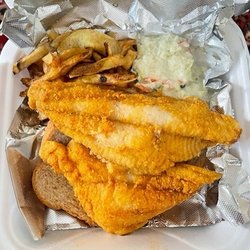 Slammin’ Sammy’s BBQ Food Truck - Generous two huge piping hot fried catfish filets, in classic light cornmeal and flour, with fries and slaw. Yum!!!