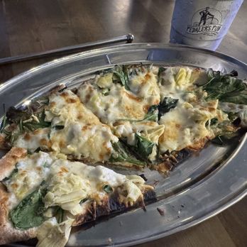 Pedaler's Pub - Spinach and artichoke pizza (Friday's #2 lunch special). - Pizza Near Me - Bentonville, Arkansas Pedaler's Pub - Spinach and artichoke pizza (Friday's #2 lunch special). - Pizza Near Me - Bentonville, Arkansas