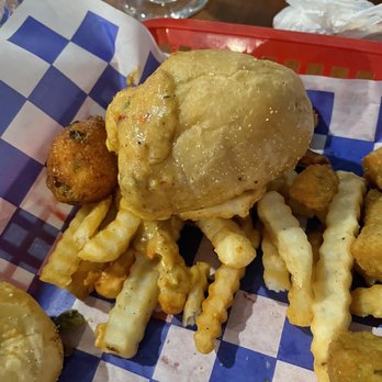 Fish River Grill 2 - About half of what I started with on my plate after jumping into the Cajun crawfish pistols! A must get item! - Seafood Near Me - Foley, Alabama