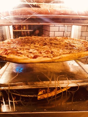 Photo of 2 Bros Pizza - New York, NY, US. Pies