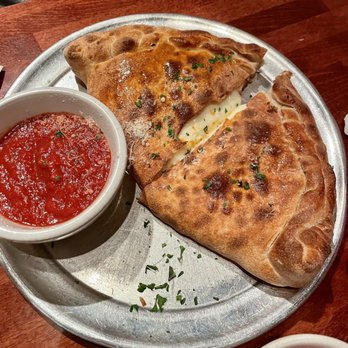 Geraldi's - Pepperoni and sausage calzone - Pizza Near Me - Fayetteville, Arkansas