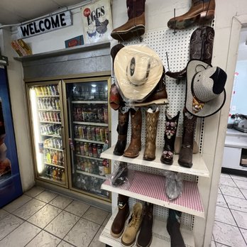 Picnic Grocery - a display of cowboy boots and hats - Grocery Near Me - Lithia, Florida