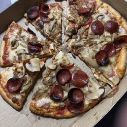 Pepperoni burnt but cheese & mushrooms cold...also not even cut properly Pepperoni burnt but cheese & mushrooms cold...also not even cut properly