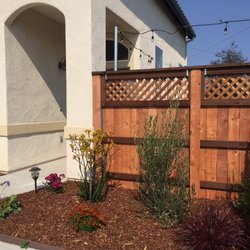 Nishimori Landscape & Design - New fence was extended about 4 feet to gain patio space.  Globe lights installed