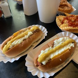 Two Mustard, Slaw, Spicy Chili, Cheese Hot Dogs with Fries, Onion Rings & a large Sweet Tea