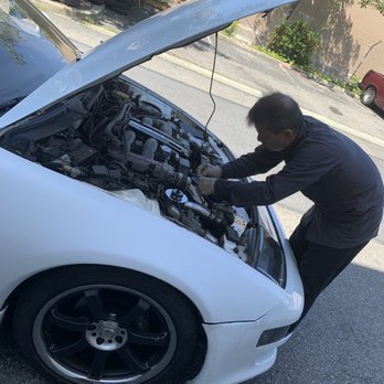 Exact Motorsports - John doing some on the spot improvements to the 30 year old connectors on my harness. - Auto Repair Near Me - Milpitas, California