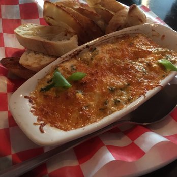 Crabby Abby's - Baked Crabby Dip: crab, artichokes and spinach served with toast points - New American Near Me - Marion, North Carolina