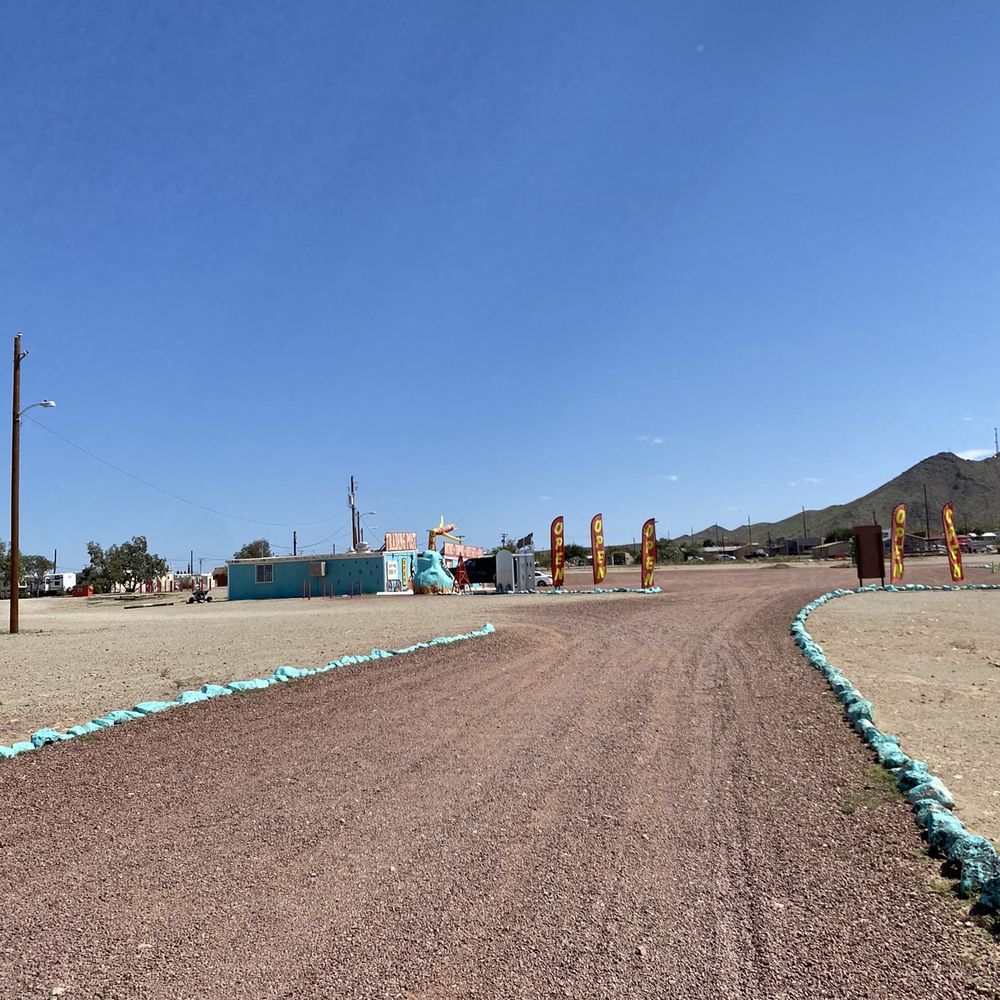 Dolan Station - a dirt road with a blue sky in the background - Convenience Stores Near Me - Dolan Springs, Arizona