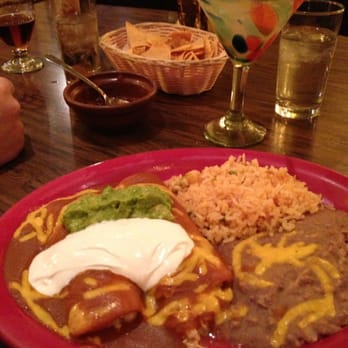 Casa Azteca - Chicken suizas enchiladas with a regular margarita on the rocks. - Mexican Near Me - Milpitas, California Casa Azteca - Chicken suizas enchiladas with a regular margarita on the rocks. - Mexican Near Me - Milpitas, California