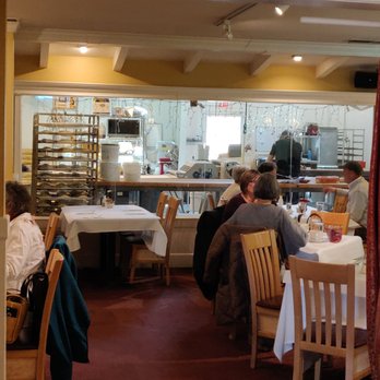 Chocolate Maven Bakery & Cafe - Dining room has view to the active bakery - Bakeries Near Me - Santa Fe, New Mexico