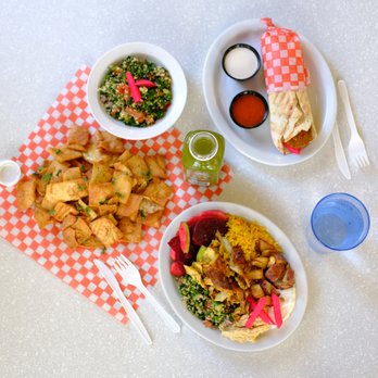Osmow's Shawarma - two bowls of food on a table - Middle Eastern Near Me - Winnipeg, Manitoba