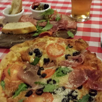 The Dickens Inn - Parma pizza and anti pasta with a Meantime lager. - Pubs Near Me - London, XGL The Dickens Inn - Parma pizza and anti pasta with a Meantime lager. - Pubs Near Me - London, XGL