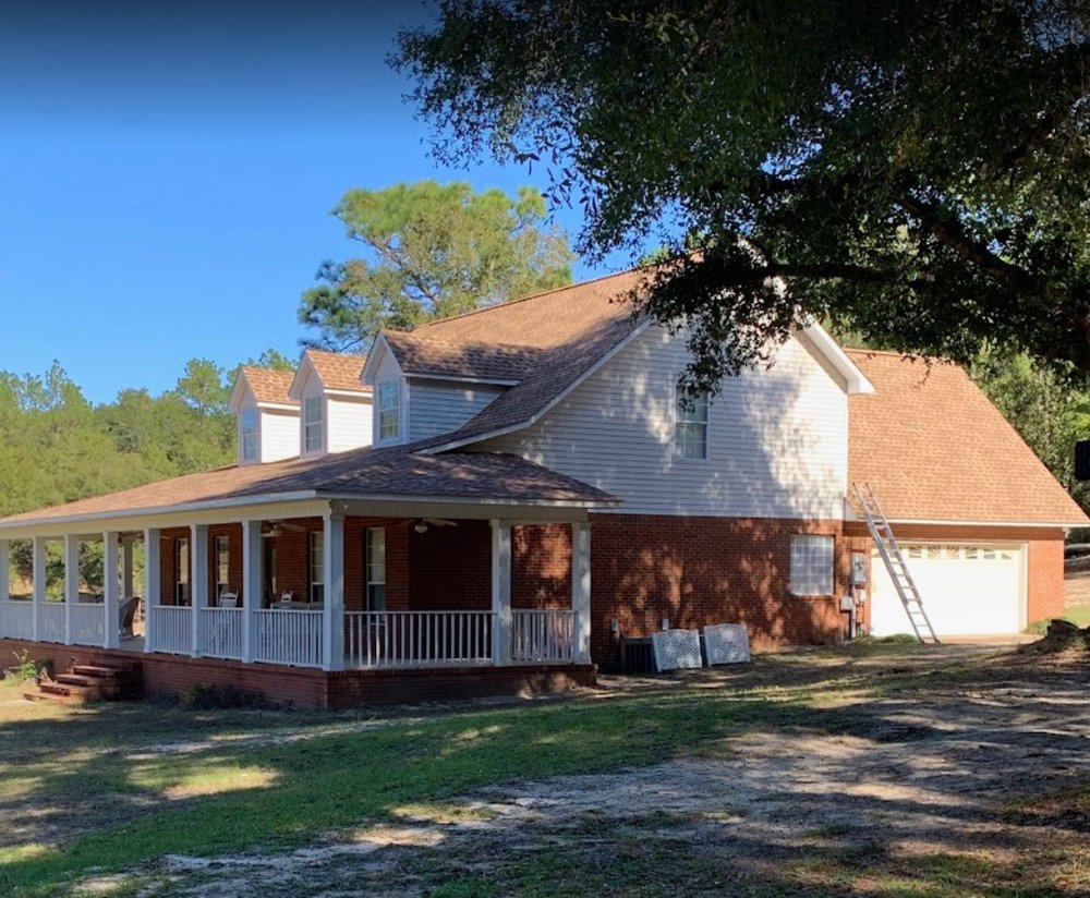 Slide of Timberman Roofing
