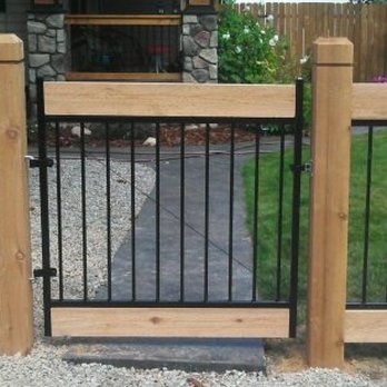 Mild Fence - Ornamental iron fence with cedar frame. - Building Supplies Near Me - Kalispell, Montana Mild Fence - Ornamental iron fence with cedar frame. - Building Supplies Near Me - Kalispell, Montana