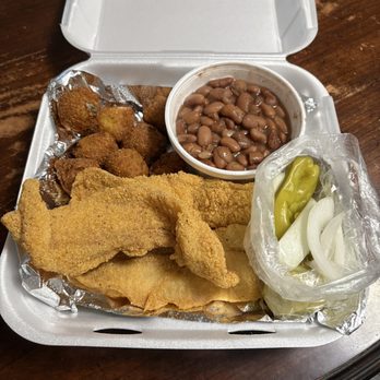 Billy Ray's Bar-B-Q & Catfish - 1/2 order of catfish with a side of brown beans and hush puppies. - Barbeque Near Me - Tulsa, Oklahoma