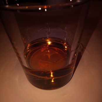 Bonefish Grill - a glass of whiskey on a table - Seafood Near Me - Johnson City, Tennessee Bonefish Grill - a glass of whiskey on a table - Seafood Near Me - Johnson City, Tennessee
