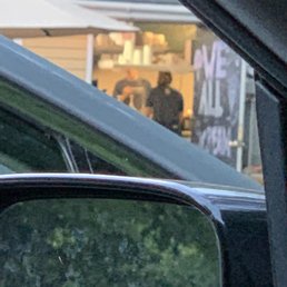 Picture of one of the staff not wearing gloves or mask. And handling our food. During a pandemic no less.