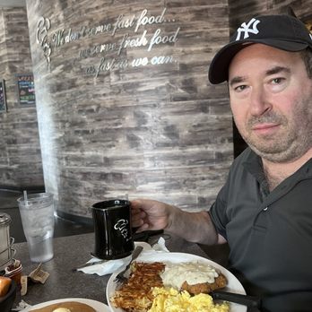 Biscuits Cafe - Enjoying his chicken & eggs - Breakfast & Brunch Near Me - Glendale, Arizona