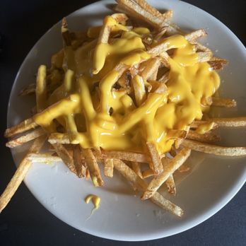 Johnny McTighe's Irish Pub - Cheese fries - Irish Near Me - Blue Mountain Beach, Florida Johnny McTighe's Irish Pub - Cheese fries - Irish Near Me - Blue Mountain Beach, Florida