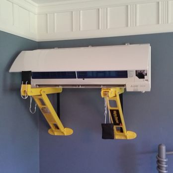 Grabill Comfort Solutions - Installing a mini split heat pump indoor unit. - Heating & Air Conditioning/HVAC Near Me - Grabill, Indiana