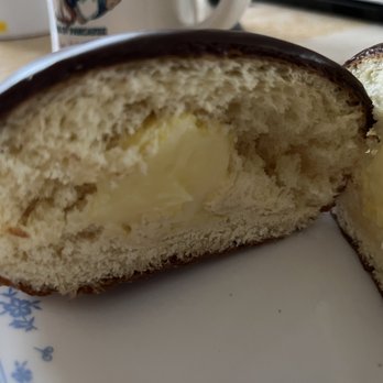 Chrusciki Bakery - Tiny amount of filling in the custard paczki. - Bakeries Near Me - Depew, New York Chrusciki Bakery - Tiny amount of filling in the custard paczki. - Bakeries Near Me - Depew, New York