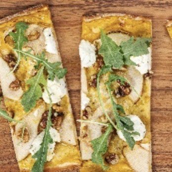 True Food Kitchen - Truffle Honey and Pear Flatbread (contains cashews) - Vegetarian Near Me - Pasadena, California True Food Kitchen - Truffle Honey and Pear Flatbread (contains cashews) - Vegetarian Near Me - Pasadena, California