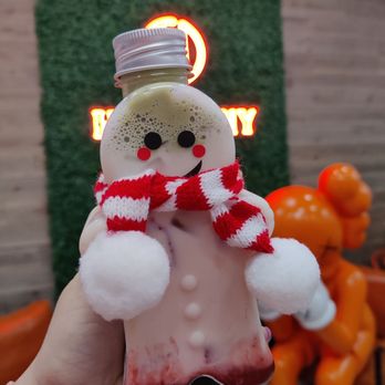 Harmony Tea Shoppe - Strawberry jasmine tea with matcha foam in a cute lil ginger bread man - Bubble Tea Near Me - Rancho Cucamonga, California