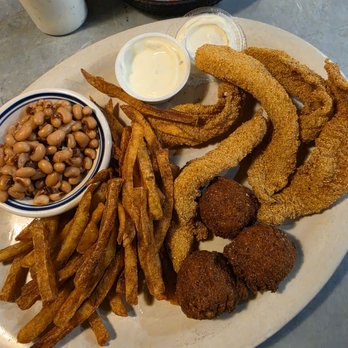 Daniel Boone's Grill and Tavern - Fried Catfish Plate with fries and black-eyed peas. - Burgers Near Me - Tyler, Texas Daniel Boone's Grill and Tavern - Fried Catfish Plate with fries and black-eyed peas. - Burgers Near Me - Tyler, Texas