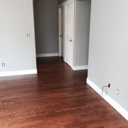 Summers removed the carpet and added hard wood to the small hallway.