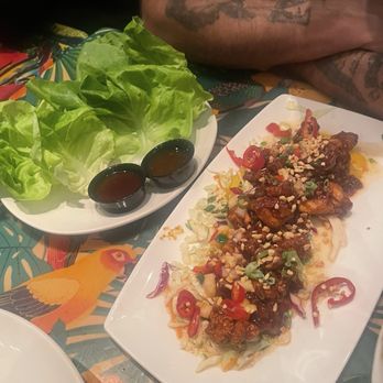 Rainforest Cafe - Spicy Korean crispy chicken wrap - American Near Me - Ontario, California Rainforest Cafe - Spicy Korean crispy chicken wrap - American Near Me - Ontario, California