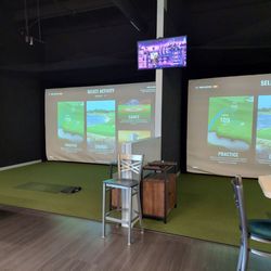 Bombay Burrito - Two golf practice spaces.