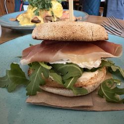 Cafe Au Lait - Eggs Benedict (back) & English Muffin Sandwich.