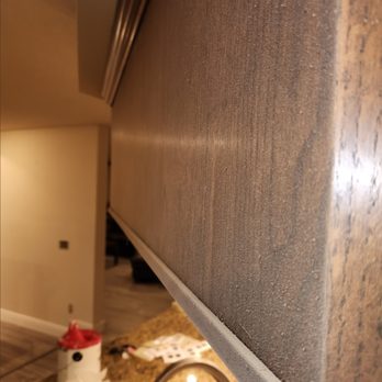 Flooring Friend - Sawdust covering cabinetry. - Flooring Near Me - Delray Beach, Florida