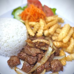 Pho Sapa - Shaken Beef with Fries and Rice
Tender, savory shaken beef served with rice and crispy fries for a satisfying meal packed with flavor.