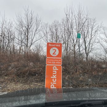 Walmart Supercenter - a parking sign on the side of the road - Department Stores Near Me - Monroe, Michigan