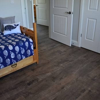 Bert Vis Flooring - a bedroom with a bed and closet - Flooring Near Me - Smithville, Ontario