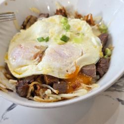 Golden Nest Pancake & Cafe - Braised beef poutine using hashbrowns (look at that yolk!)