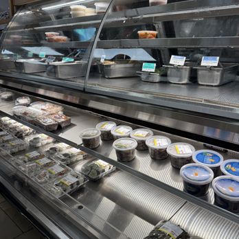 Pono Market - Deli counter full of to go items maki sushi, poi, salads, poke flavors - Hawaiian Near Me - Kapaa, Hawaii