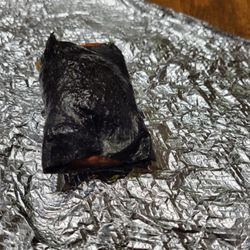 Bobablastic - This was the Spam Musubi that the vendor made. Nothing like the picture, the spam was hard and burnt.