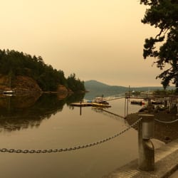 stickleback resturant - When we had a lot of fires up island it made everything a sepia colour ....but scenery was still beautiful and peaceful on patio