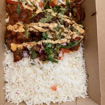 Paradise Street Eats & Biryani - Crispy butter chicken with rice - Indian Near Me - Detroit, Michigan