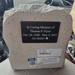 Rader's Creations - Metal plate attached to a landscaping stone nl.