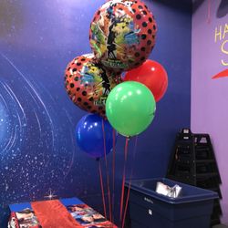 Planet Play - Miraculous ladybug balloon bouquets and a bin that holds the gifts for easy transfer to your car