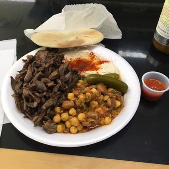 Oriental Bakery & Grocery Co - Shawarma plate with hummus and chickpeas. Don't forget a side of hot sauce. - Bakeries Near Me - Miami, Florida Oriental Bakery & Grocery Co - Shawarma plate with hummus and chickpeas. Don't forget a side of hot sauce. - Bakeries Near Me - Miami, Florida