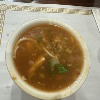 Spice N Curry - Manchow soup with garlic spring onions cilantro and spicy chicken broth - Indian Near Me - Elkridge, Maryland Spice N Curry - Manchow soup with garlic spring onions cilantro and spicy chicken broth - Indian Near Me - Elkridge, Maryland