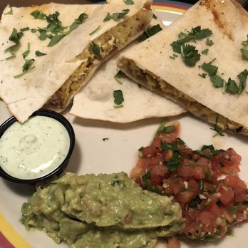 San Pedro Cafe - Breakfast quesadilla - added bacon, with sides of crema, guac and pico - Seafood Near Me - Hudson, Wisconsin